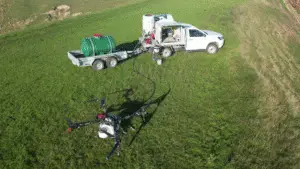 Side view of Airborne Fieldboss sprint on a ute with the XAG P150 featured infront of it